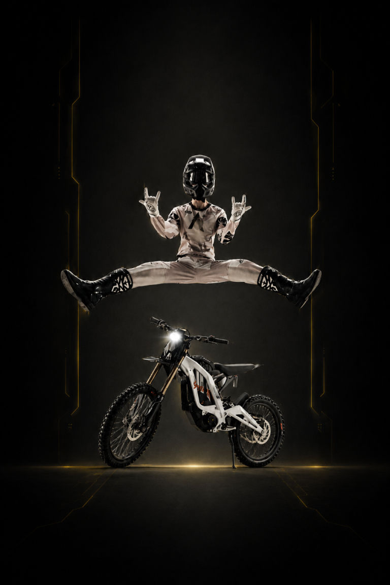 Rider in full gear next to a 2026 Sur-Ron